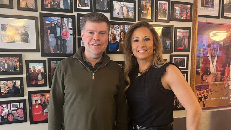 Jason Palmer for President poses for picture with Amanda Wihby at Red Arrow Diner in Manchester, New Hampshire.